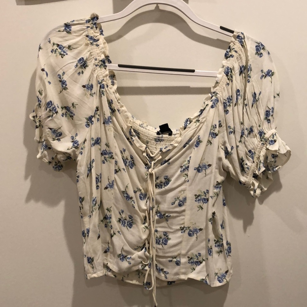 White Blouse with Blue Flowers